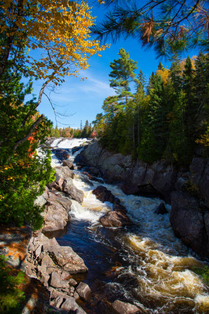 istock Waterfall at Sand River in autumn in Ontario Canada 1188903918
