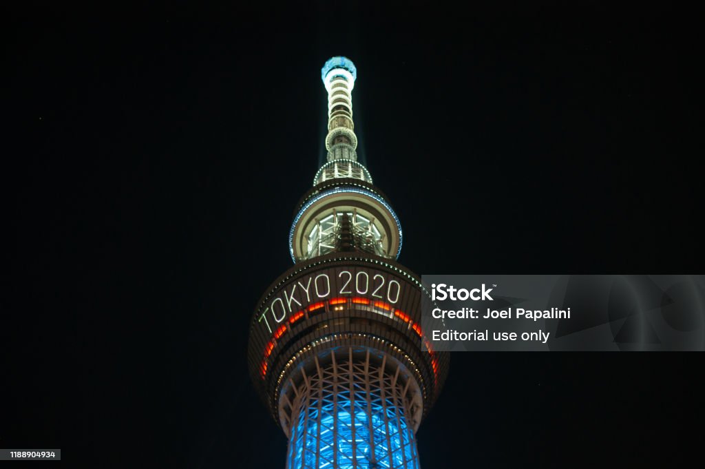 The skytree tower is illuminated at night announcing the olympics of Tokyo 2020. Tokyo, Japan - July 29, 2019: The skytree tower is illuminated at night announcing the olympics of Tokyo 2020. 2020 Summer Olympics - Tokyo Stock Photo
