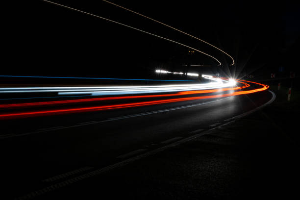 istock lights of cars with night 1188907210