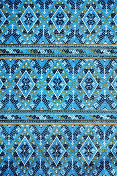 istock Thai silk ancient fabric handcraft designer textiles peruvian stripe beautiful background detail pattern fashionable 1188907352