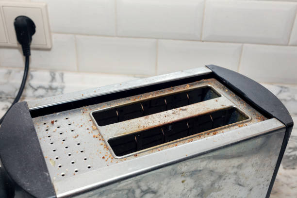 istock dirty bread toaster in the kitchen 1188908592