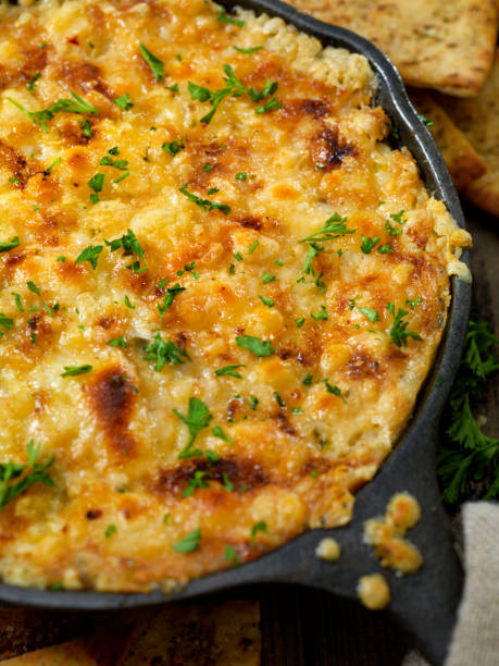 istock Baked Artichoke and Asiago Cheese Dip with Crispy Pita Chips 1188909873