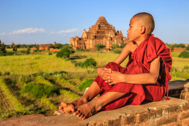 istock Young Buddhist monk looking at the view, Bagan, Myanmar 1188910196