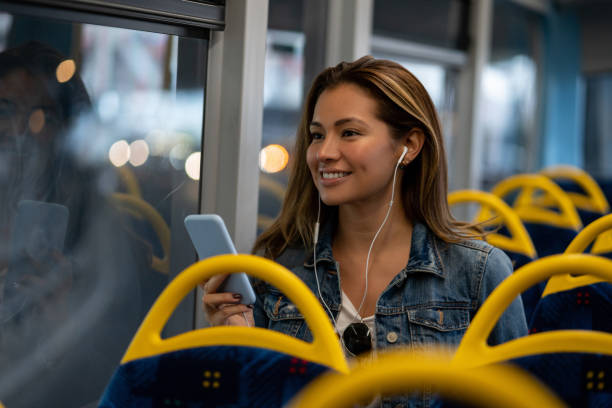 istock Happy woman riding on the bus 1188910225
