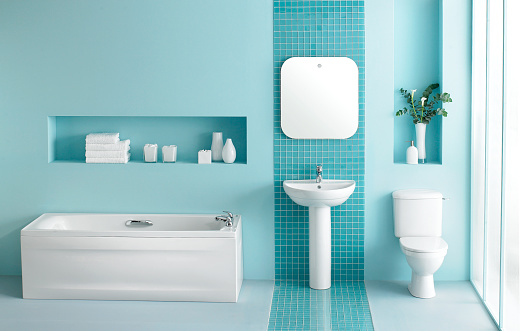 Interior of large luxurious bathroom in turquoise blue