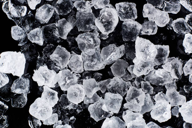 istock top view of icy ice cubes isolated on black 1188910547