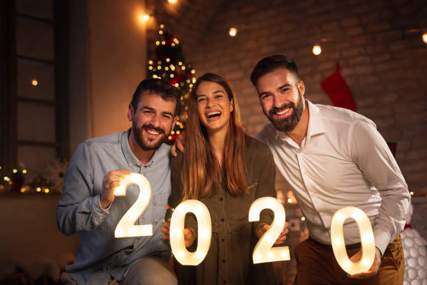 istock Friends having fun at New Years Eve party 1188910663