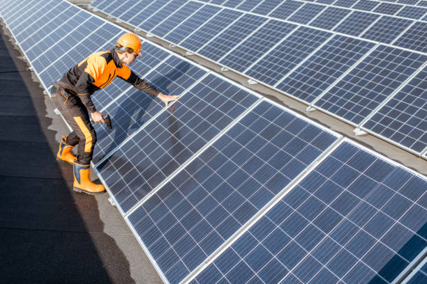 istock Worman on the solar station 1188910738