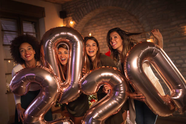 istock Girlfriends at New Year party 1188910767