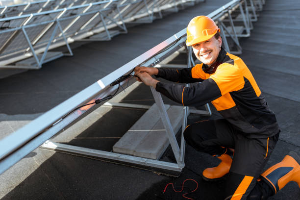 istock Electrician connecting solar panels 1188911719