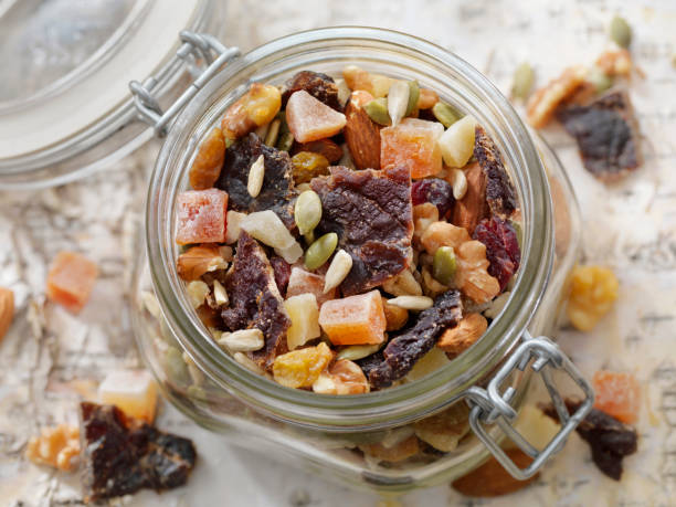 beef jerky trail mix - cashew apple fruit food jar foto e immagini stock