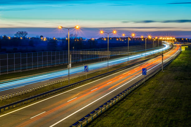 istock lights of cars with night 1188913103