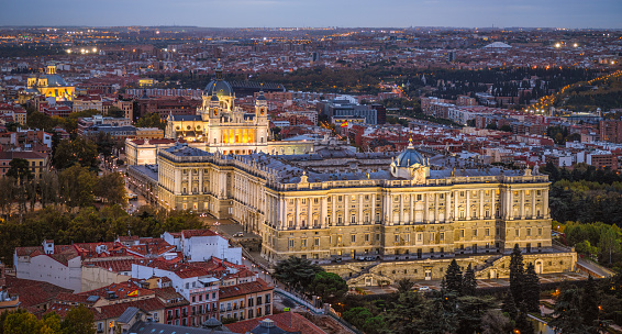 Madrid, Spain  - October 30, 2019: aerial view of  Palacio real (royal palace) and almudena cathedral at sunset