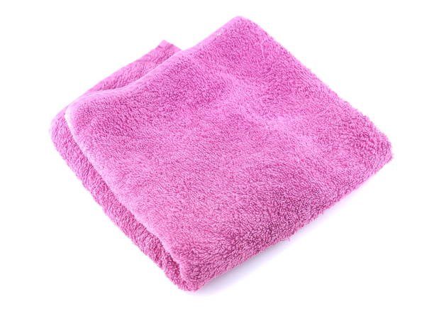 istock pink towel on a white background 1188915984