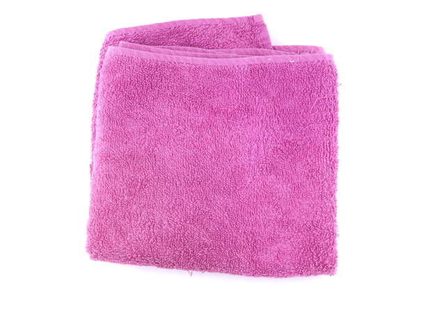 istock pink towel on a white background 1188916385