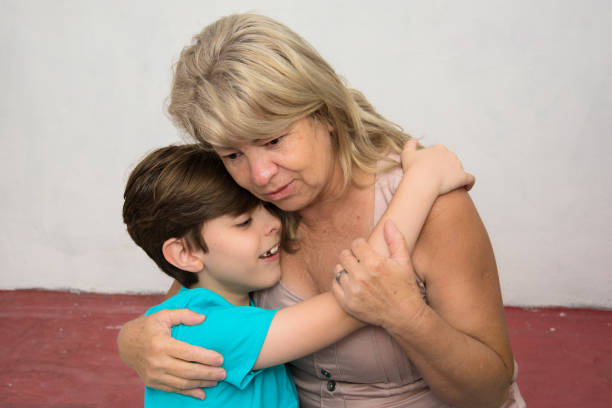 grandson hugging grandmother