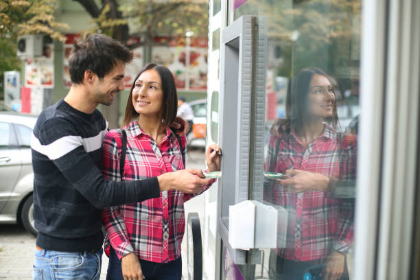 istock Couple at an ATM 1188917895