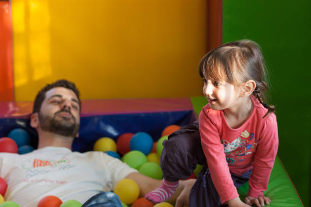 istock Father looking at his daughter 1188920073