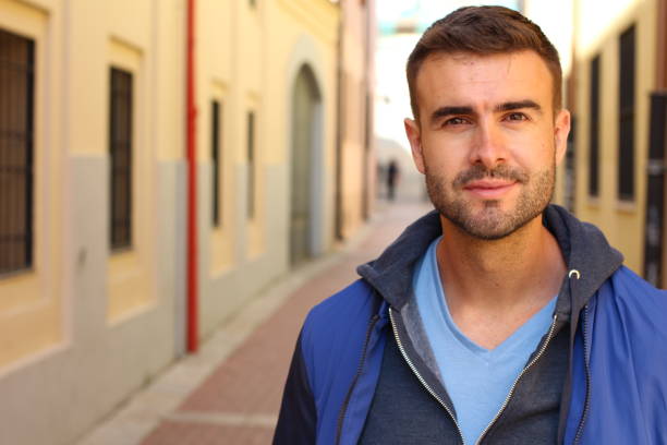istock Gorgeous man looking at camera outdoors 1188920090