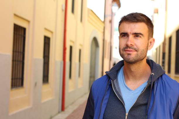 istock Gorgeous young man walking outdoors 1188920703