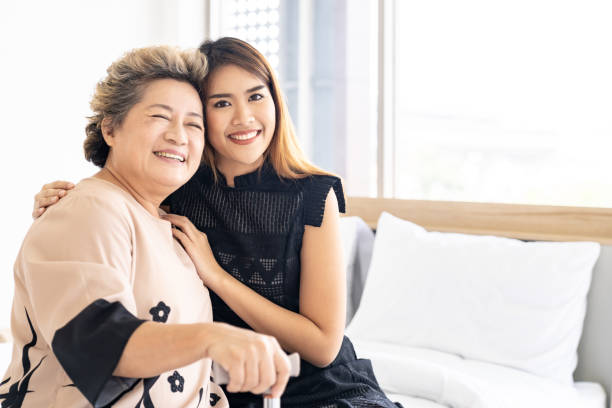 istock Daughter hug elderly mother 1188923241