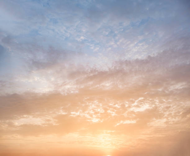 orange and blue twilight sky - color image light pink dramatic sky imagens e fotografias de stock