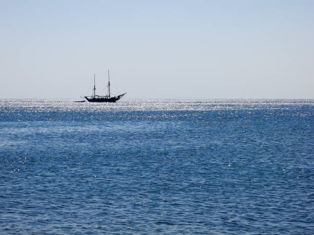 istock twin mast felucca on the horizon in backlight 1188924532