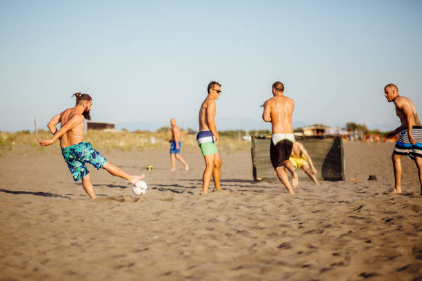 istock Good friends playing soccer 1188925368