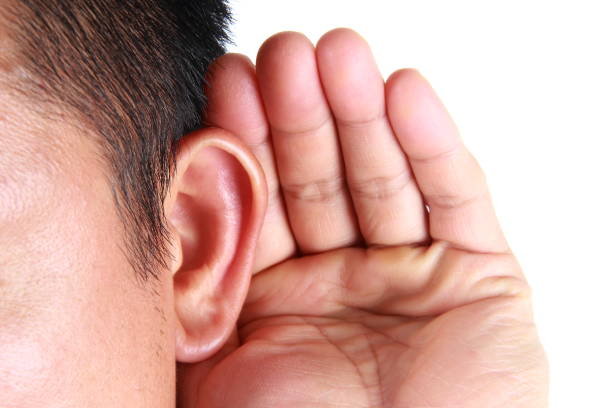 istock Man listening with his hand on an ear 1188926155