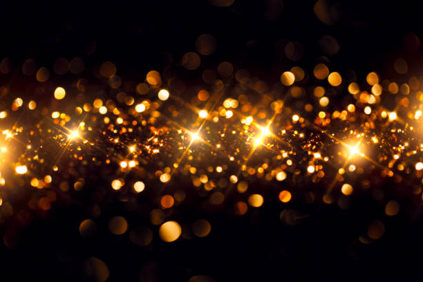istock Golden Glitter on Black - Christmas Backgrounds Celebration 1188926361