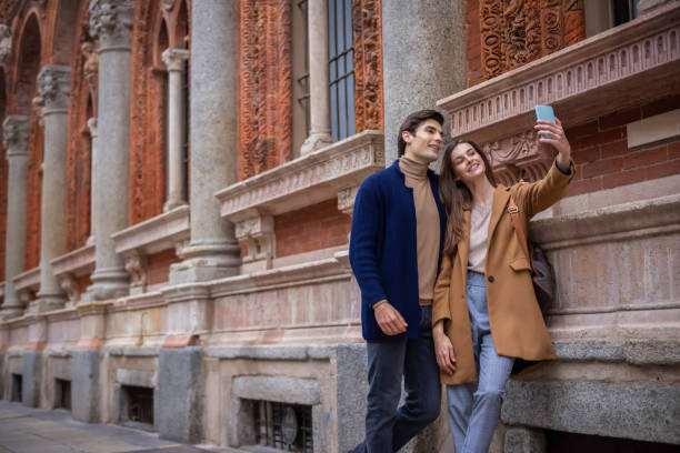 istock romantic couple walking through the city 1188932099