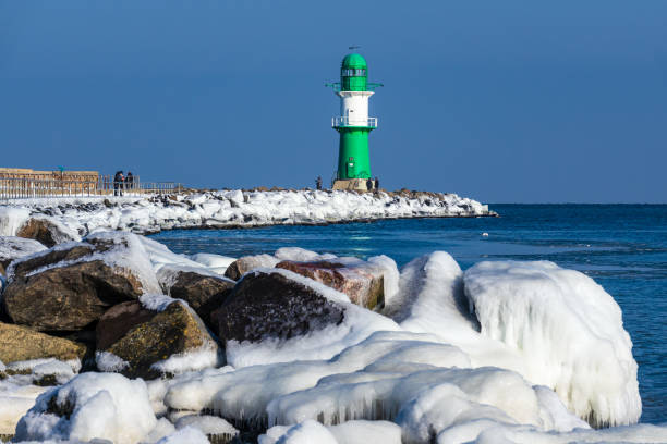 istock Mole in winter time in Warnemuende, Germany 1188934864