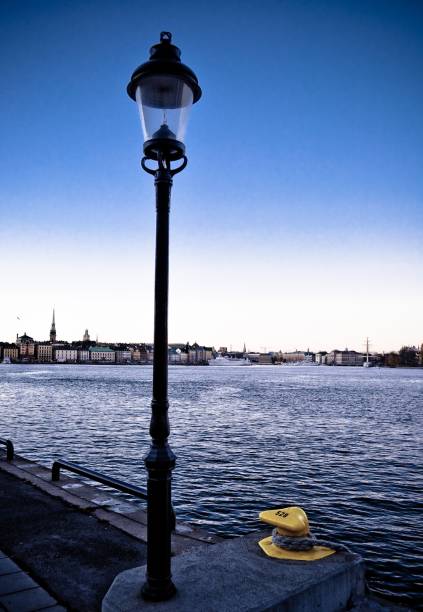 istock City lantern standing alone on the pier 1188939298