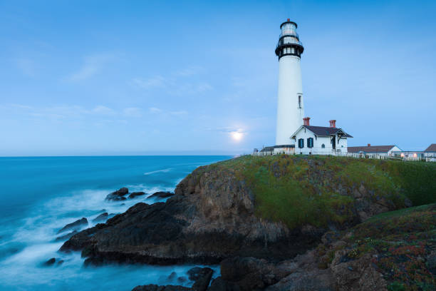 istock White pigeon point lighthouse with a blue sky  Historic Old Lighthouse at sunset - Pigeon Point Lighthouse - California, USA 1188939301