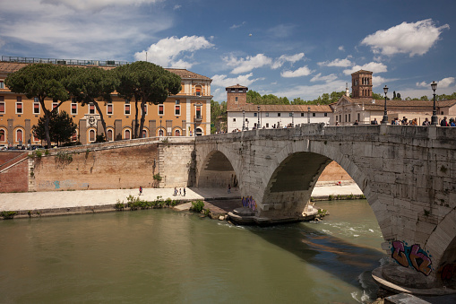 Horizontal view of Ponte Cestio that connects the Tiber Island with Trastevere District, Rome