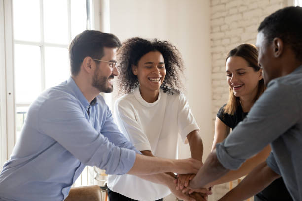 istock Overjoyed multiracial group engaged in funny teambuilding activity. 1188939604