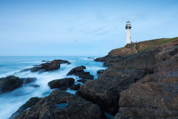 istock White pigeon point lighthouse with a blue sky  Historic Old Lighthouse at sunset - Pigeon Point Lighthouse - California, USA 1188939932