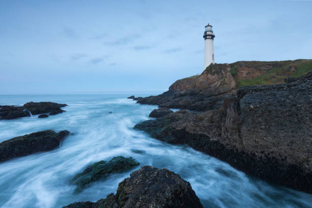istock White pigeon point lighthouse with a blue sky  Historic Old Lighthouse at sunset - Pigeon Point Lighthouse - California, USA 1188940193