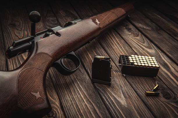 istock Classic bolt carbine .22lr with a wooden butt isolate on a white background 1188940346