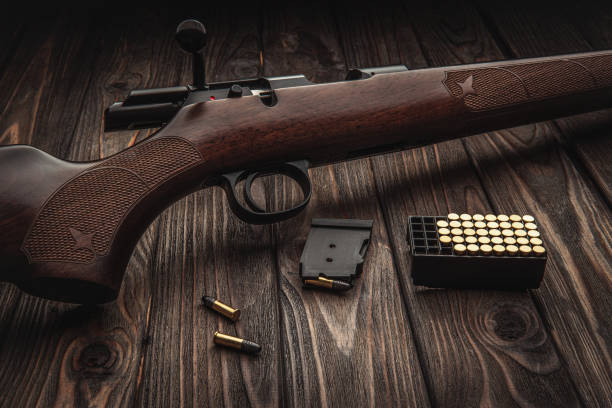 istock Classic bolt carbine .22lr with a wooden butt isolate on a white background 1188940396