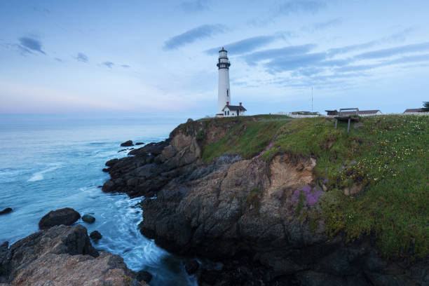 istock White pigeon point lighthouse with a blue sky  Historic Old Lighthouse at sunset - Pigeon Point Lighthouse - California, USA 1188940697