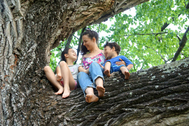 istock young mother with children 1188943472
