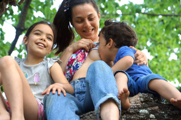 istock young mother with children 1188944216