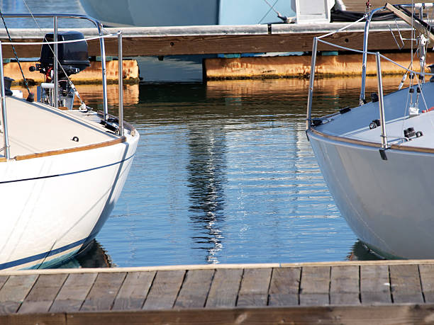 istock Two sailboats in berths at the marina 118894488