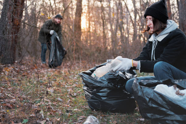 istock People clean up the forest of plastic trash. 1188948012