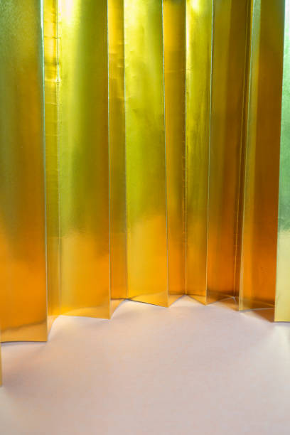 Gold metallic paper background with diagonal lines
