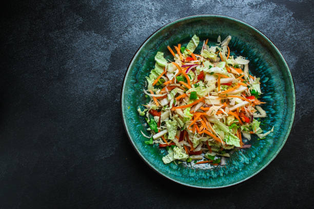 istock vegetable salad (Chinese cabbage, carrot, onion, lettuce, mix salad) menu concept. food background. top view. copy space 1188951859