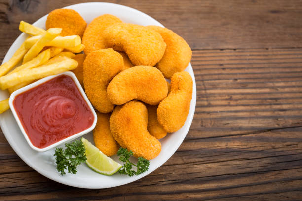 istock Chicken nuggets with ketchup on the plate 1188954157