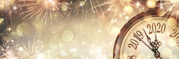 istock New Year 2020 - Midnight With Clock And Fireworks 1188954810