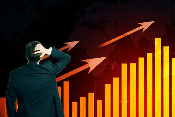 istock Businessman looking at business chart 1188954989